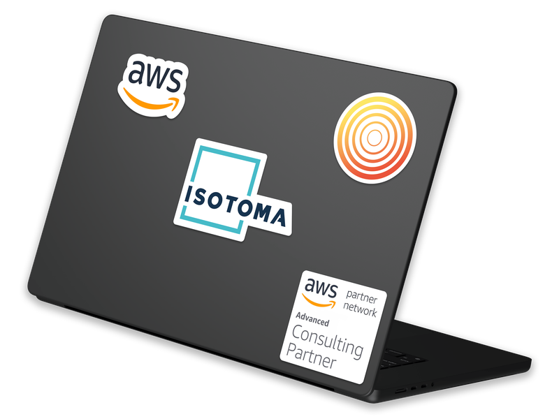 A MacBook Pro with stickers on it showing the AWS, Isotoma, Tenth Revolution, and AWS Advanced Consulting Partner logos